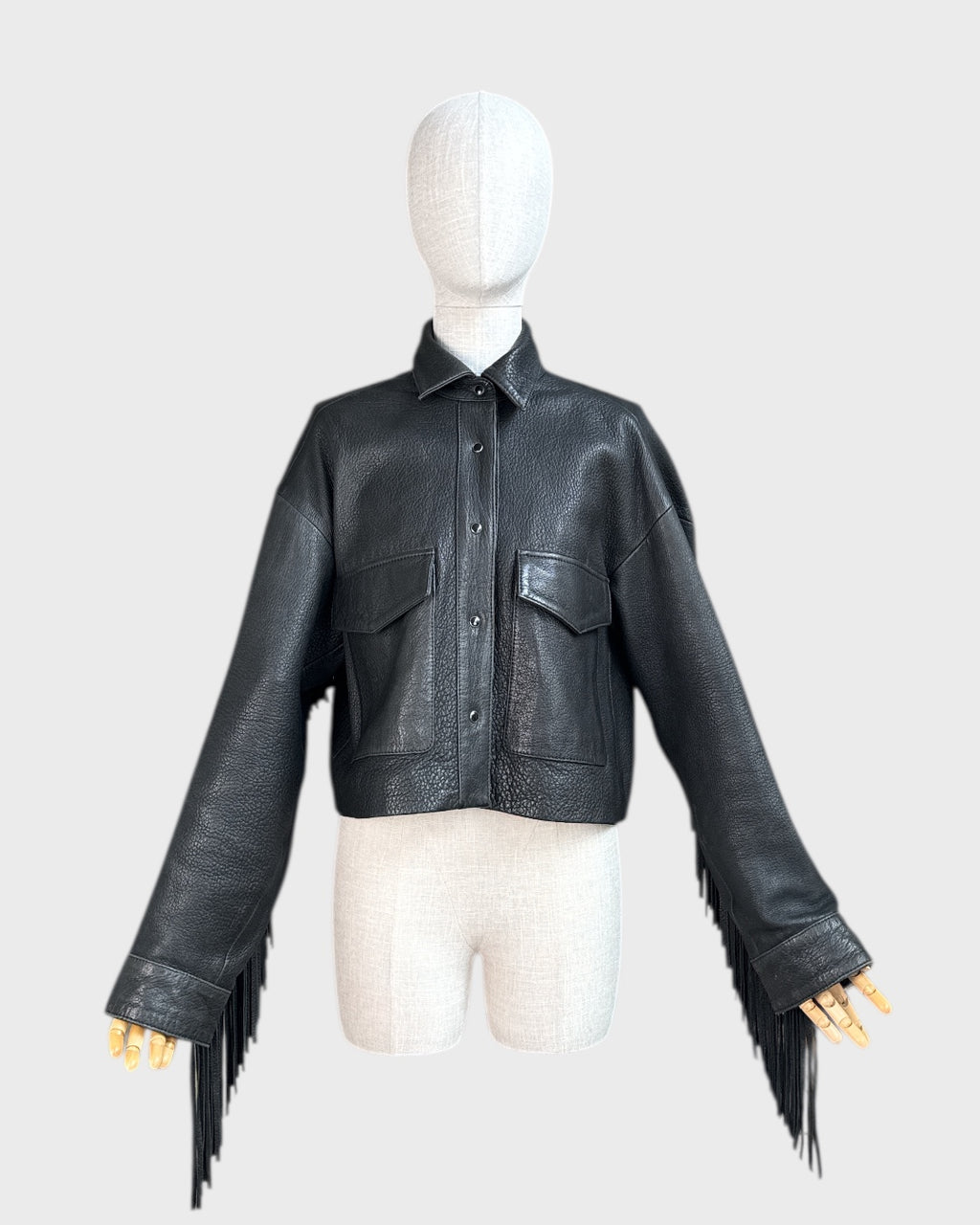 Black fringed leather jacket by The Kooples