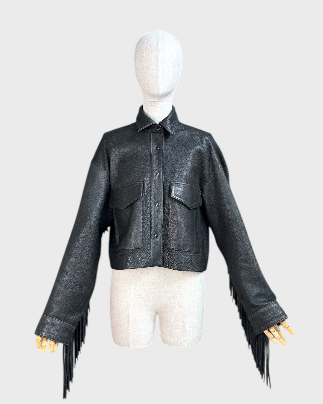 Black fringed leather jacket by The Kooples